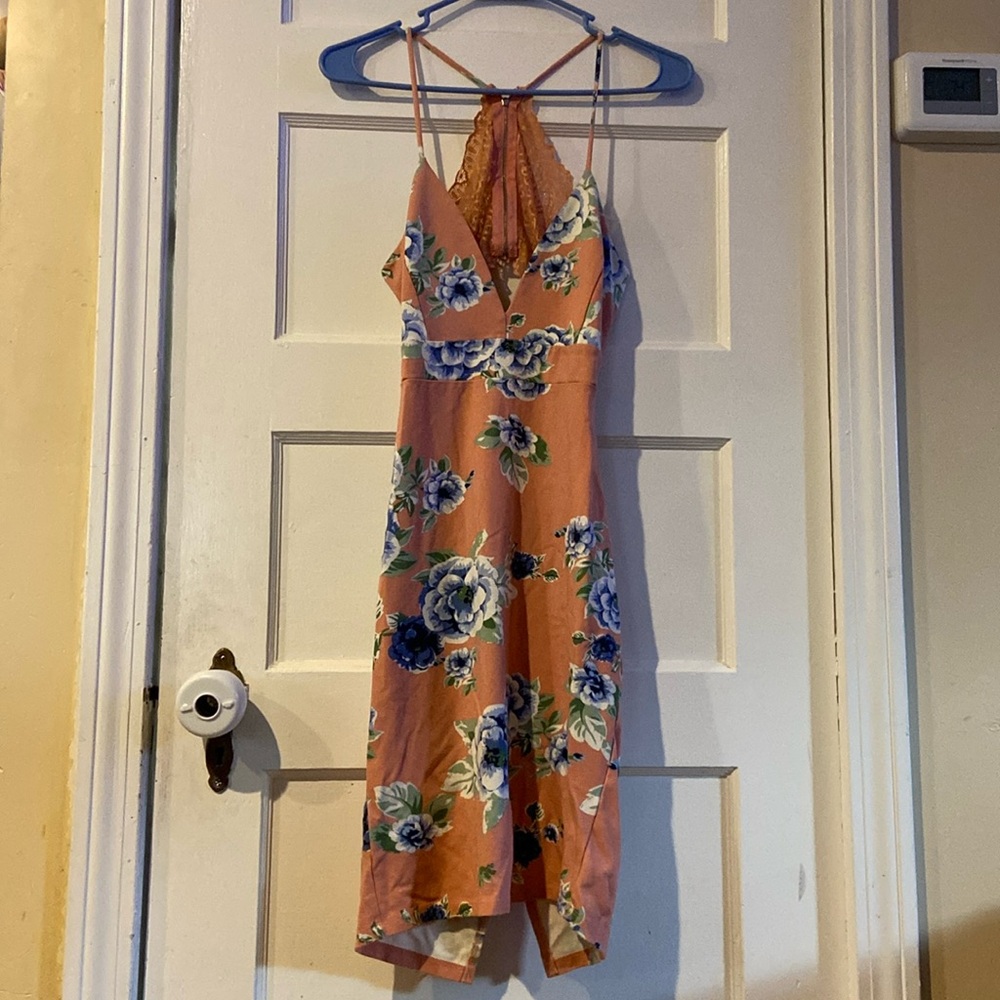 I am selling a pink dress with blue flowers size US Large